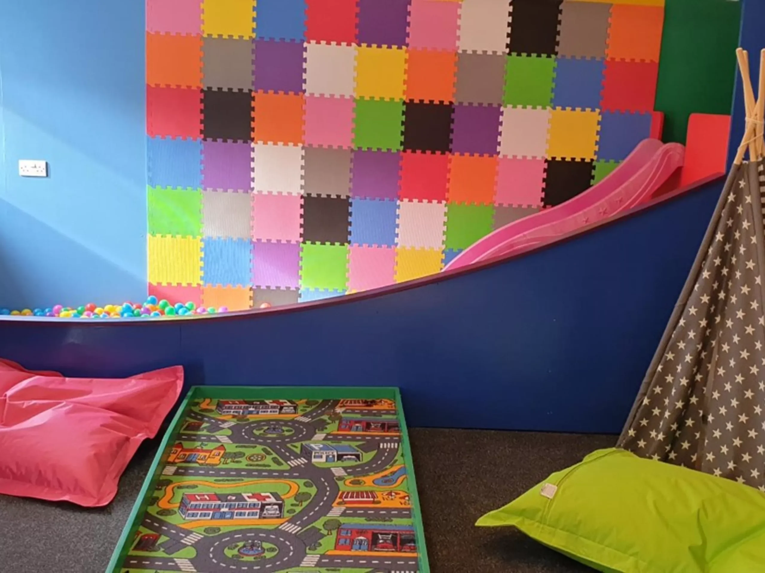 Slide and ballpit in Woodend House games room