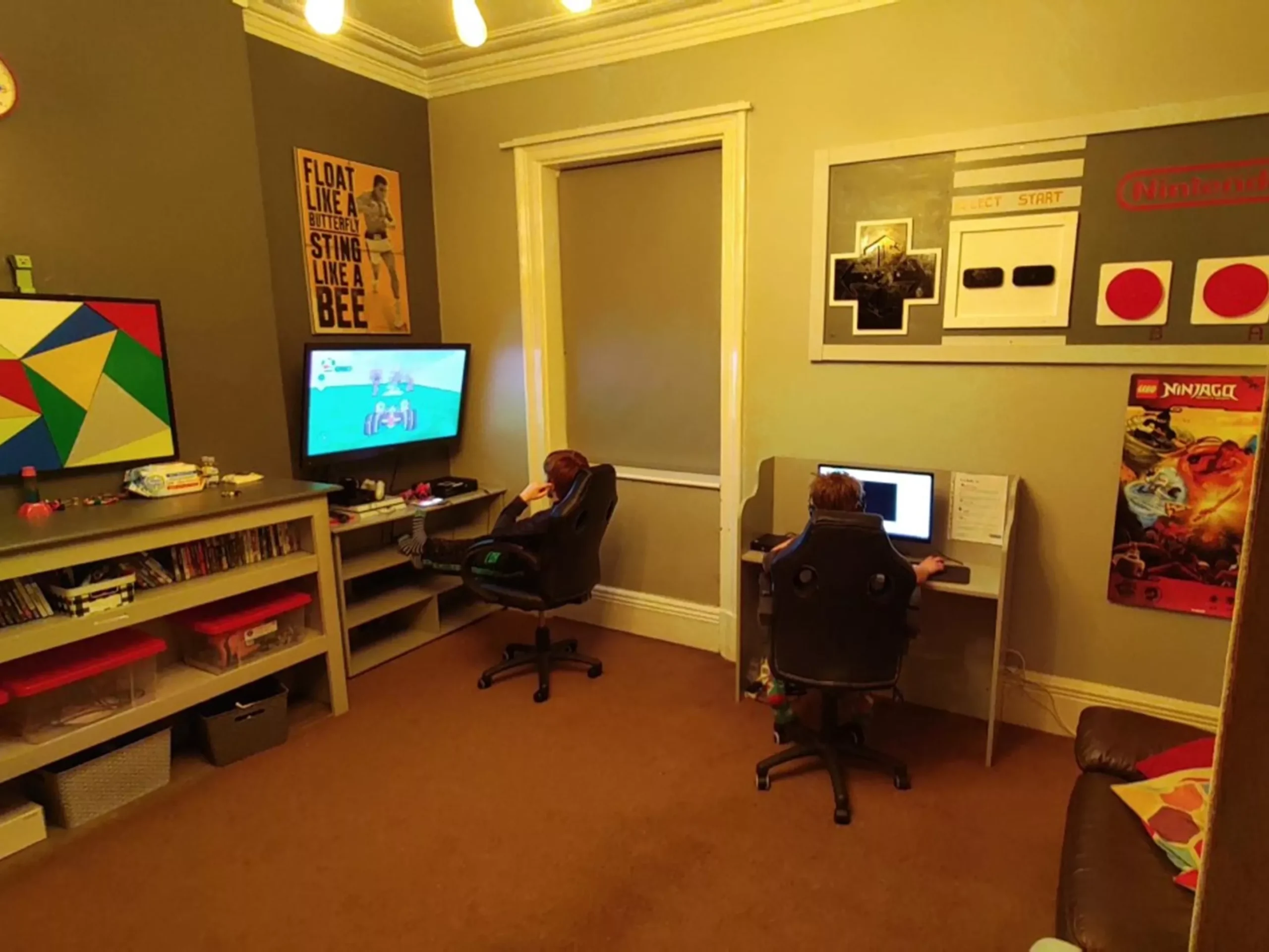 Young people on computers in the Kenilworth House games room