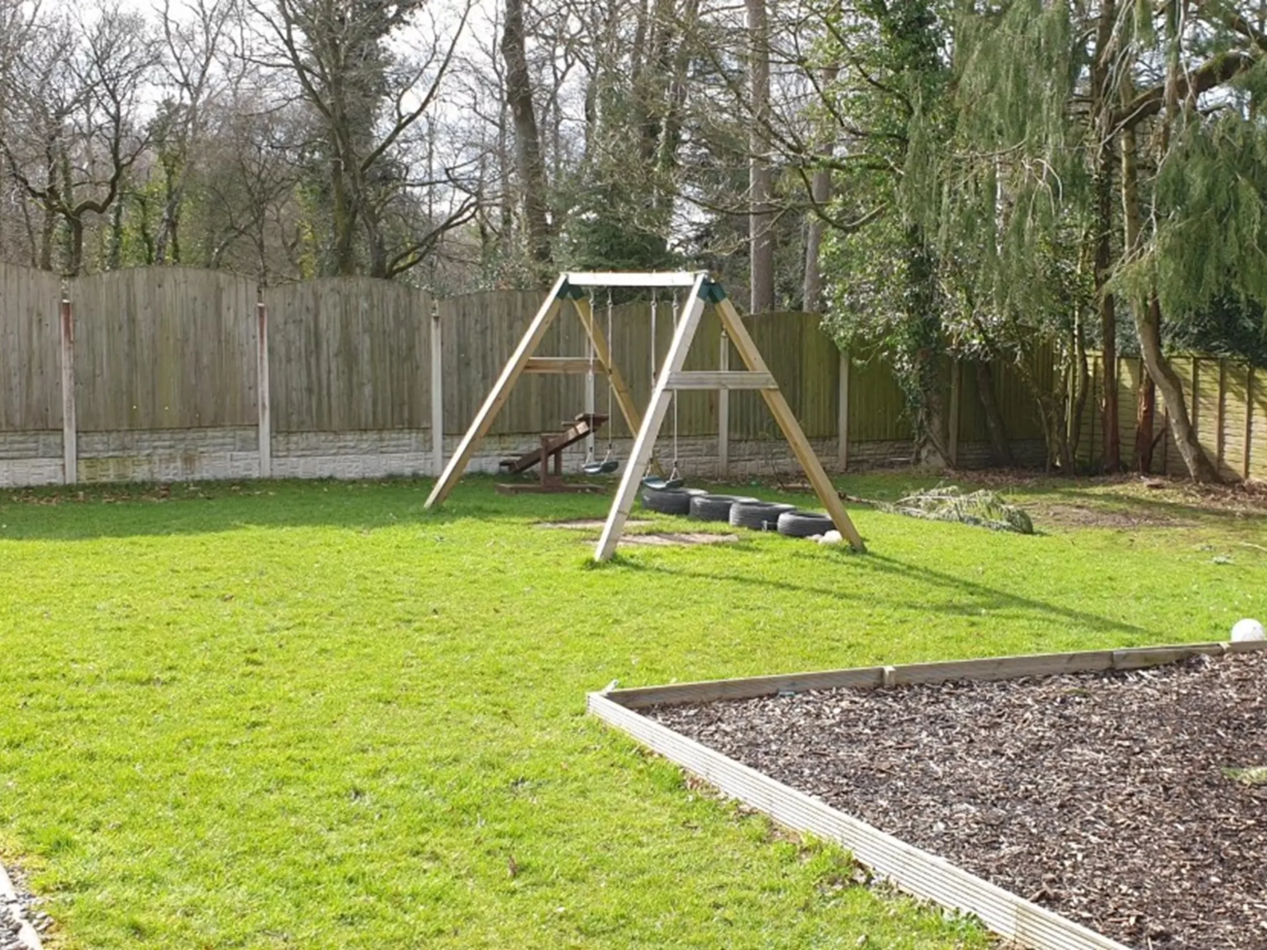 Swings in the Woodend House garden