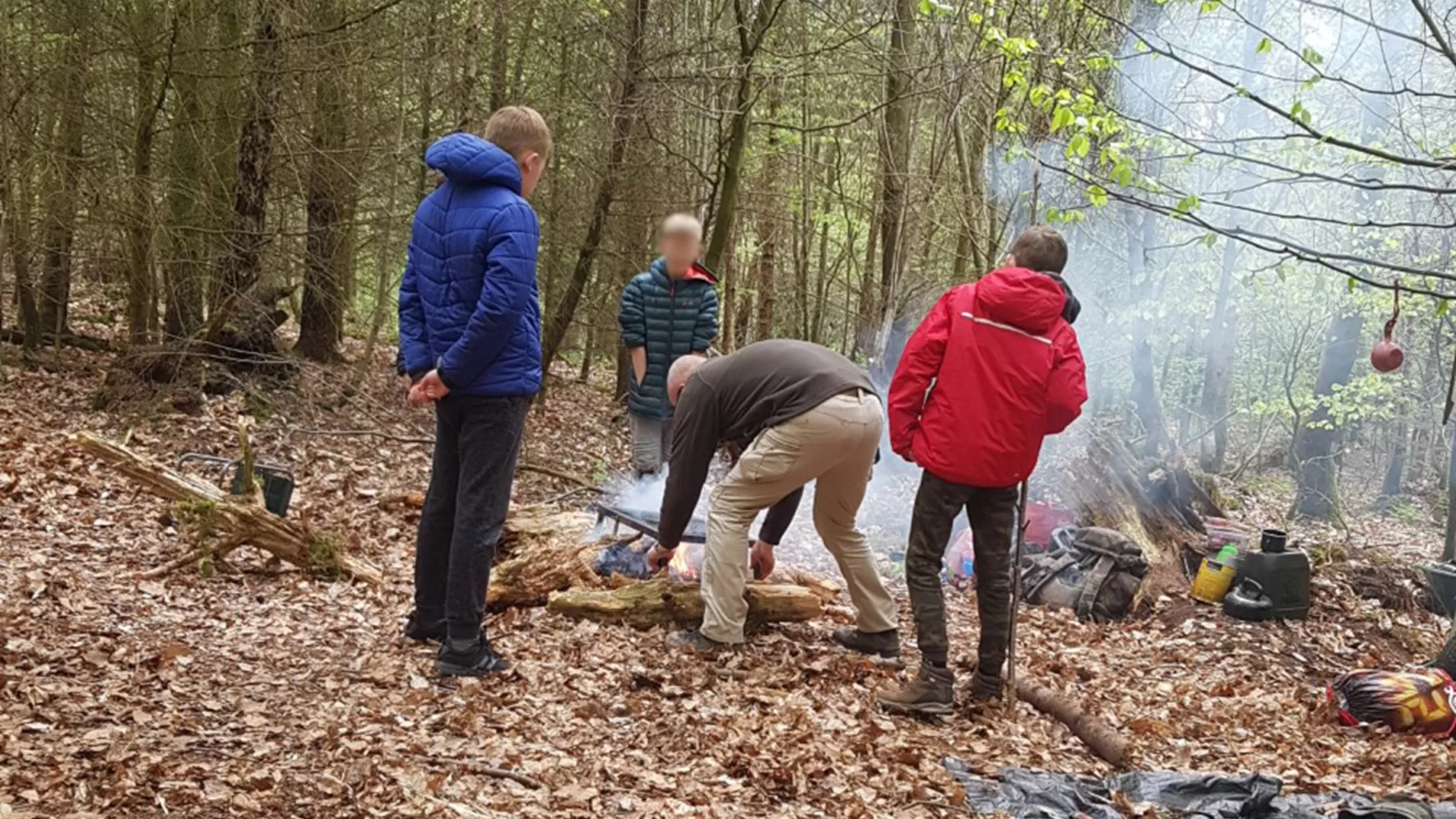 Young people taking part in camp craft at North Lakes