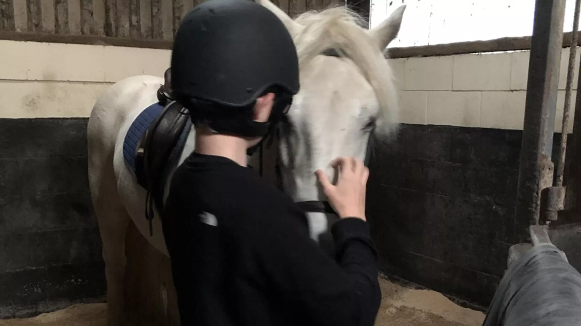 Young person horse riding at North Lakes