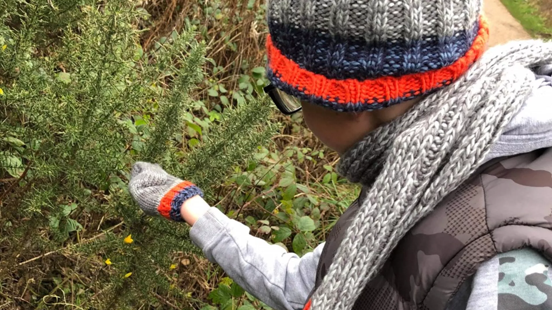 Young person taking part in a nature walk at North Lakes