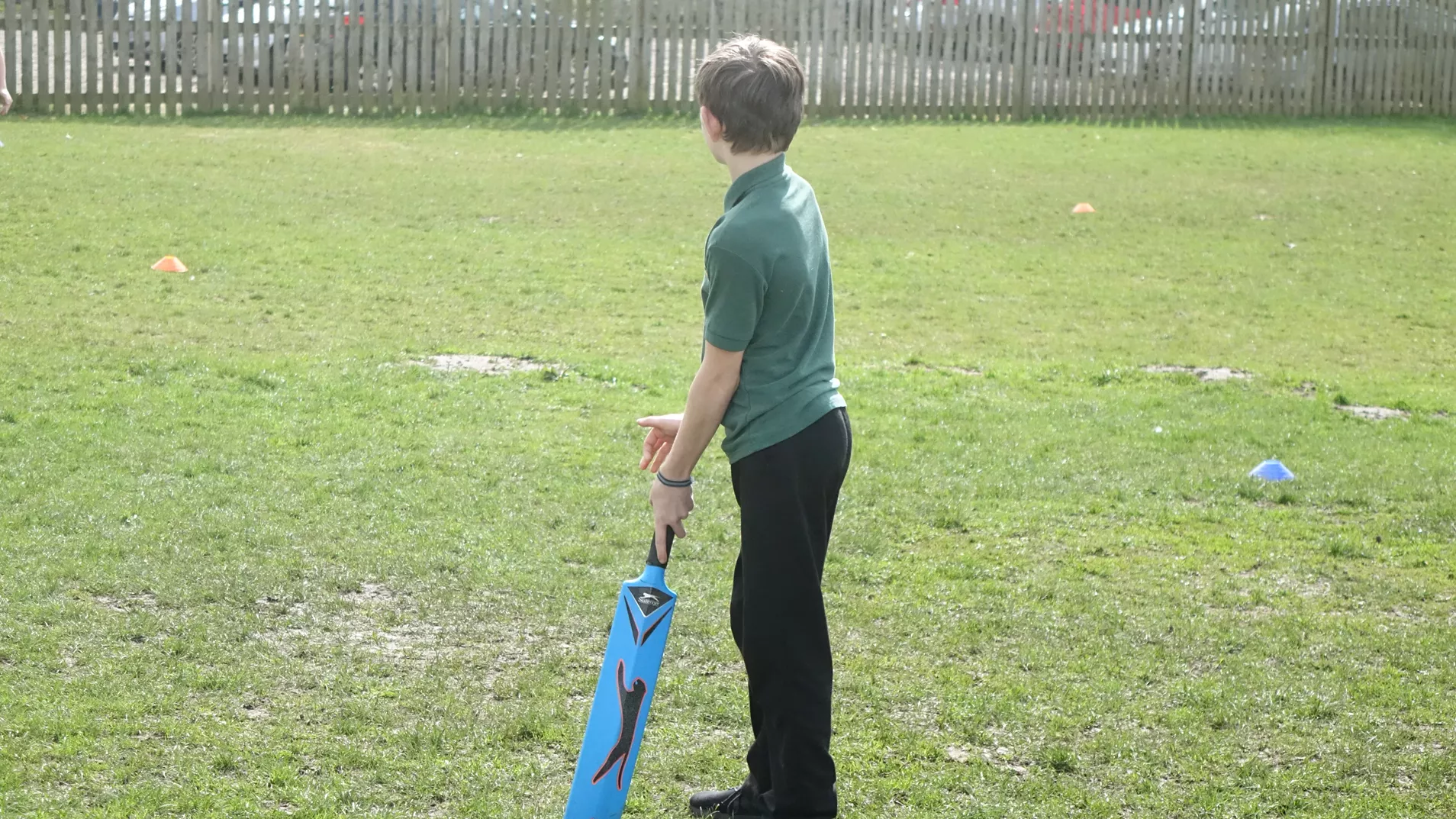 Kirby Moor school pupil holding cricket bat waiting to be bowled at