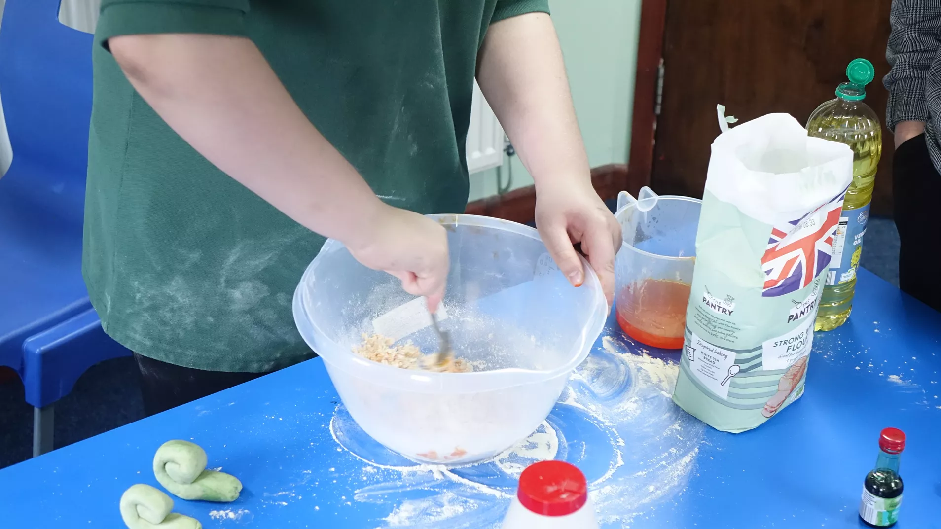 Kirby Moor pupil making a cake