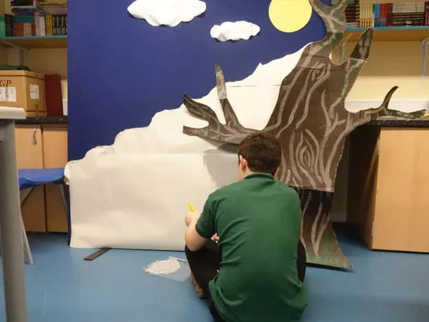 Kirby Moor School pupil painting a landscape